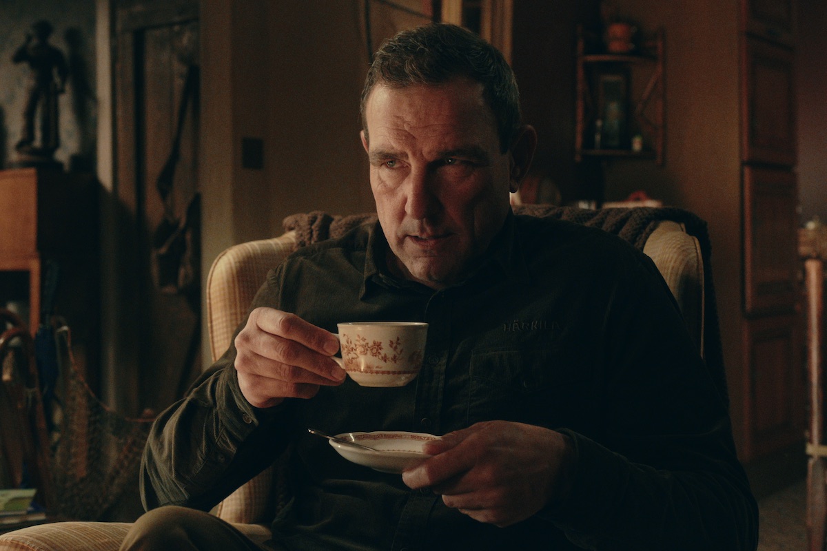Geoffrey Seacombe — Vinnie Jones as Geoff Seacombe drinks a cup of tea in Season 1 of ‘The Gentlemen’